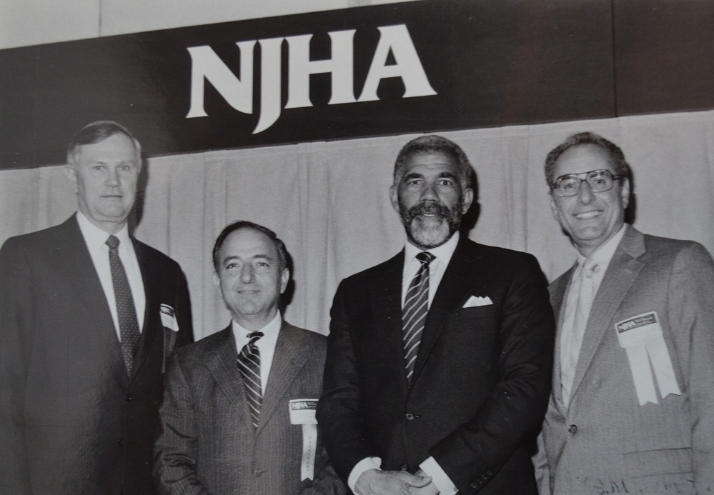 Ed Bradley, third from left, the popular 60 Minutes correspondent, spoke at the 1988 NJHA Annual Meeting. Donald Davis, CEO of Hunterdon Medical Center and immediate-past Chair of the NJHA Board, left, is photographed with NJHA President and CEO Lou Scibetta, Bradley and incoming chair, Kenneth Courey, president of St. Clare’s Hospital in Denville.