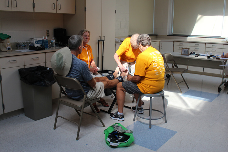 Physicians screening a patient.