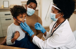 Doctor treating child.