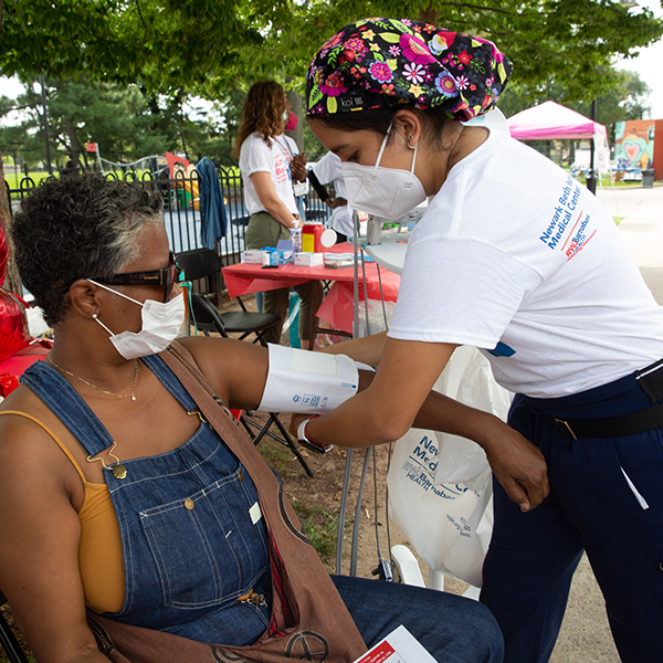 Newark Beth Israel Medical Center provides blood pressure screenings at a local health fair.